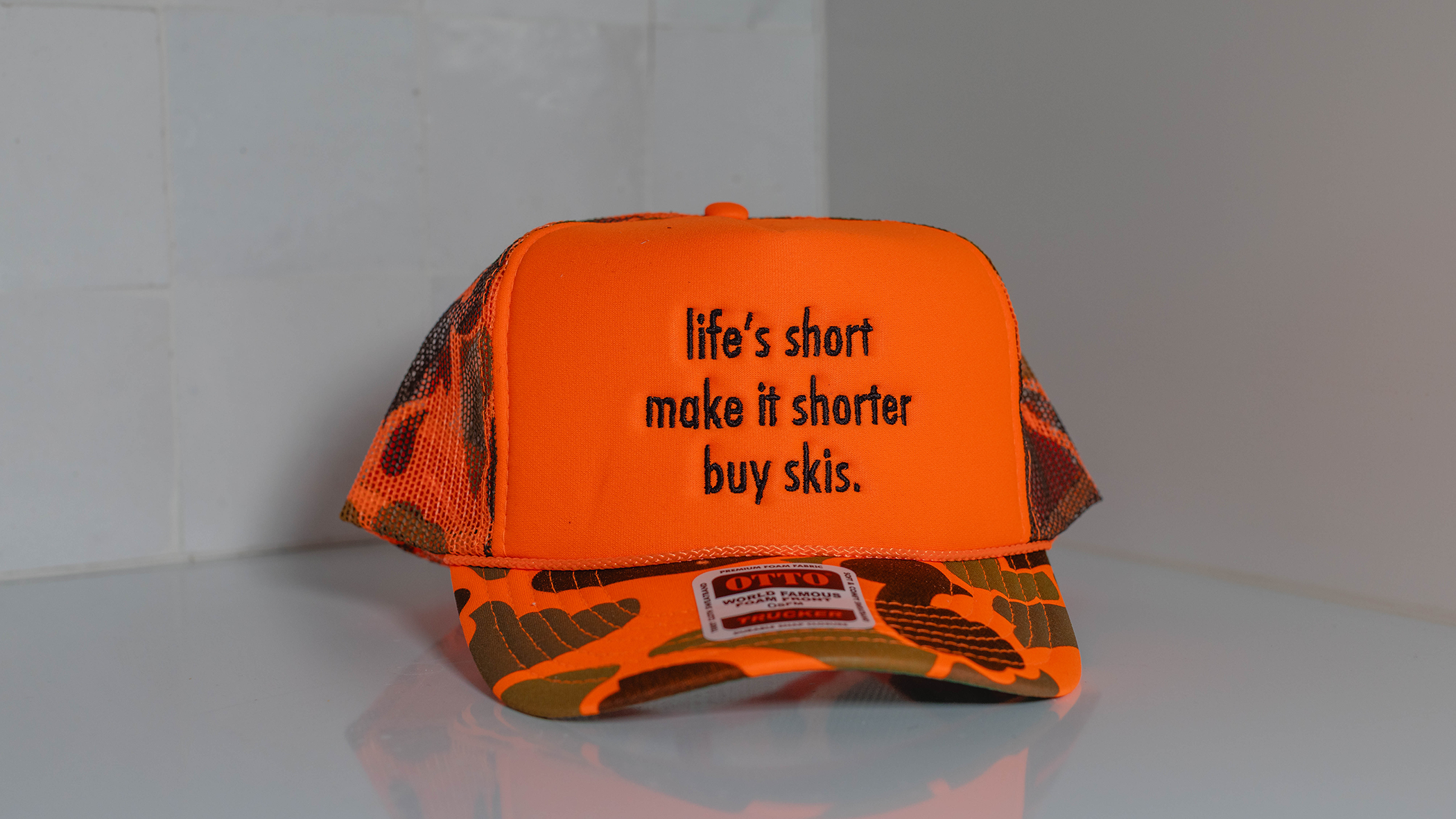 life's short trucker cap